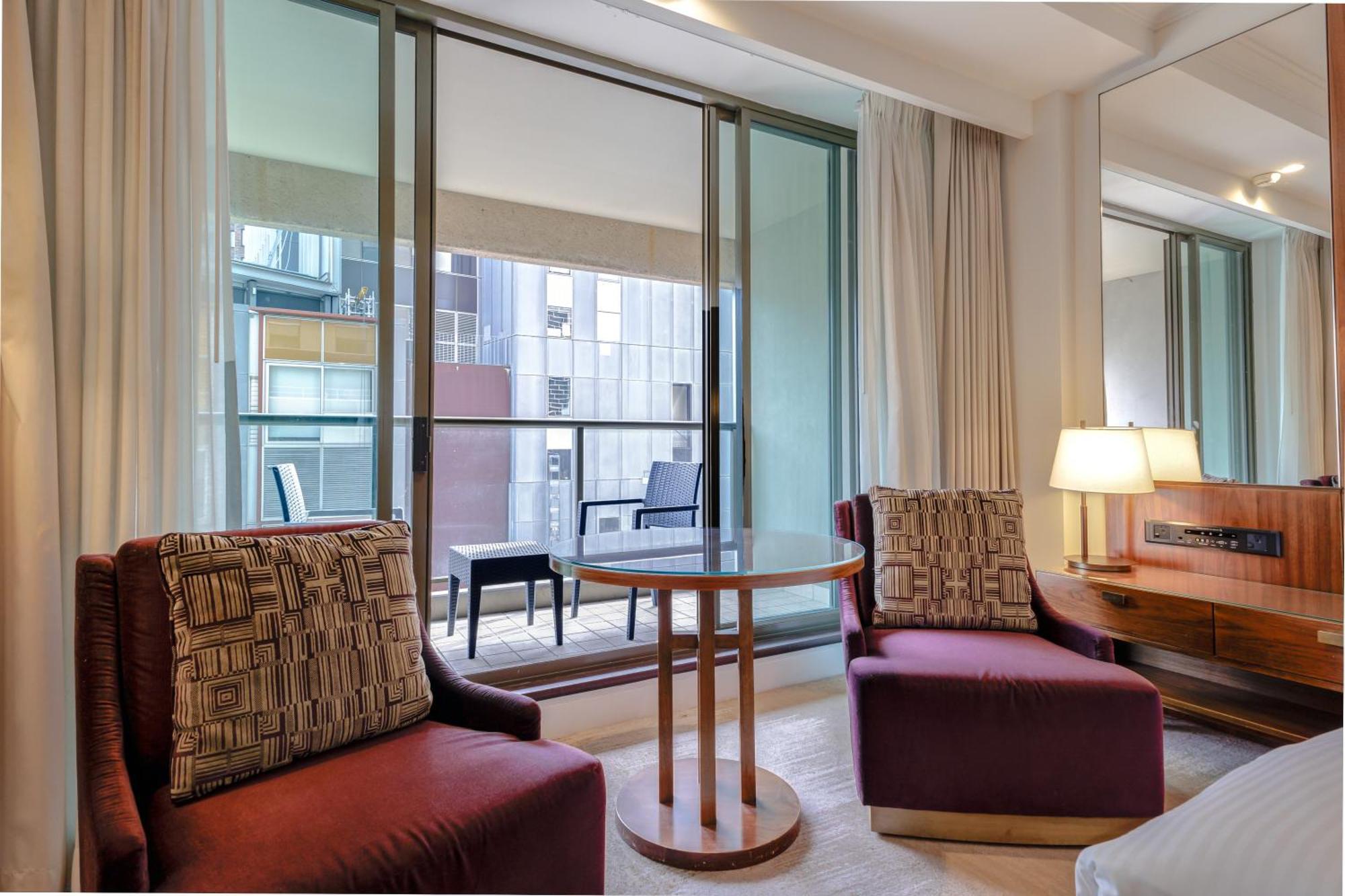 Amora Hotel Jamison Sydney Exterior foto A room at the hotel
